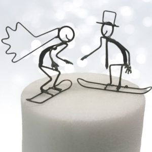 bride and groom snowboarding cake toppers