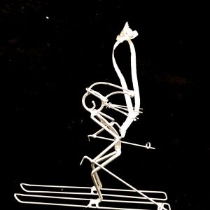 female silver skier ornament